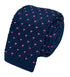 Navy dark blue knitted tie with bright hot pink pin spots
